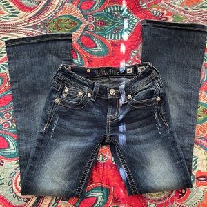 Boot cut. Never worn!! Did take tags off.